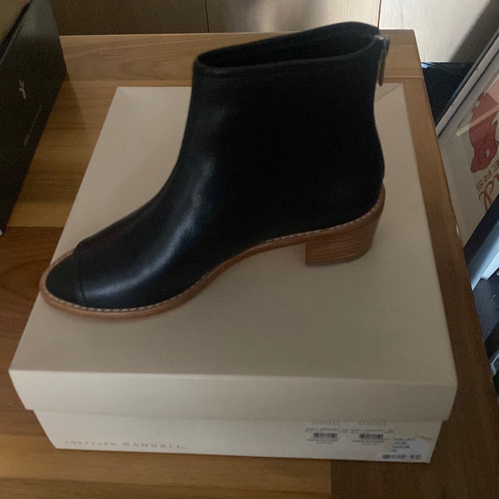 Never worn size 6 1/2 boot